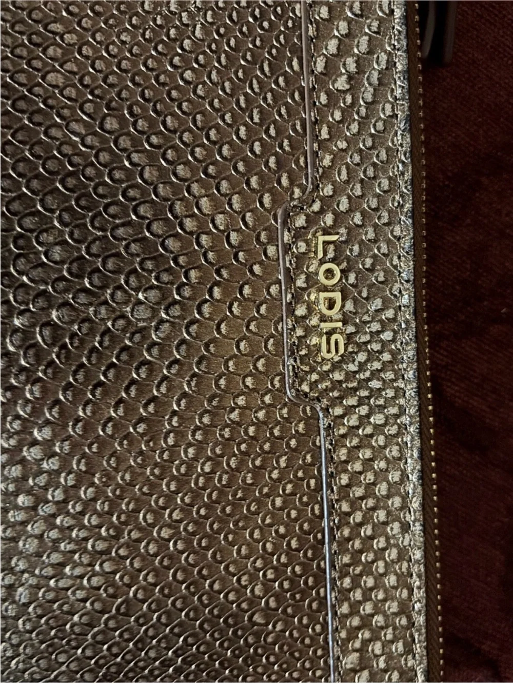 Lodis snakeskin embossed wristlet wallet bag